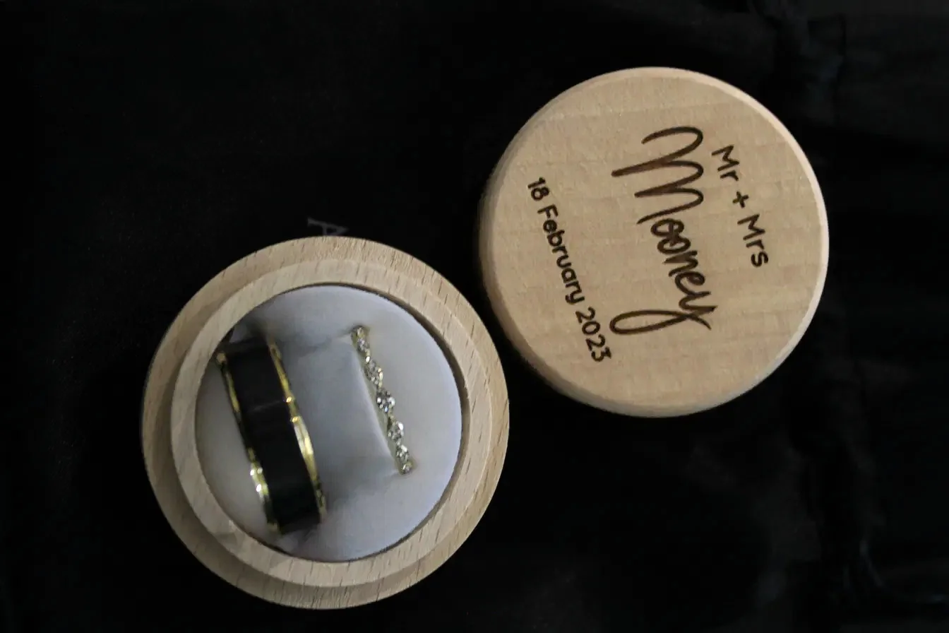 Wedding rings in a personalised timber ring box